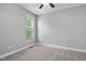 Bright, airy room with plush carpet and neutral paint ready for your personal touch at 304 Nelson Ln, Clayton, NC 27527