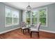 Bright breakfast nook with plenty of natural light shining through multiple windows at 304 Nelson Ln, Clayton, NC 27527