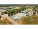 Aerial view of a community pool featuring multiple pools and slides, perfect for Gathering fun at 304 Nelson Ln, Clayton, NC 27527