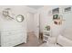 Adorable Bedroom features a white dresser, comfortable chair and well-organized shelving at 3113 Chelmshire Ct, Raleigh, NC 27610