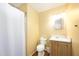 Bathroom featuring a shower with curtain, vanity, and toilet at 327 Woodbridge Dr, Chapel Hill, NC 27516