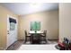 Dining area featuring seating for two and a door to the outside at 327 Woodbridge Dr, Chapel Hill, NC 27516