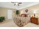 Tranquil primary bedroom with a tray ceiling and lots of room featuring neutral color palette at 3633 Willow Stone Ln, Wake Forest, NC 27587