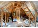 Unfinished attic space shows the structure and potential for customizable storage or living area at 3650 Brooks Bnd, Franklinton, NC 27525