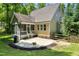 Backyard featuring a patio, a wooden fence, and green grass at 3650 Brooks Bnd, Franklinton, NC 27525