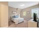 Comfortable bedroom with natural light and a calming ambiance, creating a relaxing retreat at 3650 Brooks Bnd, Franklinton, NC 27525