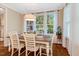 Bright dining room features natural light, hardwood floors, and ample seating for Gathering gatherings at 3650 Brooks Bnd, Franklinton, NC 27525