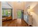 Spacious foyer with gleaming hardwood floors, high ceilings, and elegant decor create a grand entrance at 3650 Brooks Bnd, Franklinton, NC 27525