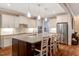 Spacious kitchen with a large island, granite countertops, stainless steel appliances, and ample seating at 3650 Brooks Bnd, Franklinton, NC 27525