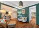 Inviting living room showcases hardwood floors, elegant decor, and comfortable seating, perfect for relaxation at 3650 Brooks Bnd, Franklinton, NC 27525