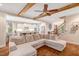 Open-concept living room flows seamlessly into the kitchen with natural light and comfortable seating at 3650 Brooks Bnd, Franklinton, NC 27525