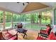 Relaxing screened-in porch, perfect for enjoying the outdoors while being protected from the elements at 3650 Brooks Bnd, Franklinton, NC 27525
