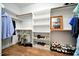 Organized walk-in closet with shelves and hanging rods, providing ample storage for clothing, shoes, and accessories at 3650 Brooks Bnd, Franklinton, NC 27525