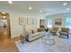 Bright, inviting living room with large windows and stylish seating, creating a comfortable atmosphere at 3838 Regent Rd, Durham, NC 27707