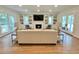 Comfortable living room featuring a fireplace, built-in bookshelves, and inviting decor at 3838 Regent Rd, Durham, NC 27707