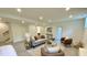 Spacious living room with comfortable seating, recessed lighting, and a door to the outside at 3838 Regent Rd, Durham, NC 27707