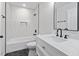 Modern bathroom with stylish black fixtures and a new toilet and sink at 3907 Inwood Dr, Durham, NC 27705