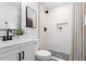Modern bathroom with a glass-enclosed shower, sleek vanity, and stylish fixtures at 3907 Inwood Dr, Durham, NC 27705