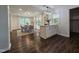 Dining area with table and chairs adjacent to open-concept kitchen at 3907 Inwood Dr, Durham, NC 27705
