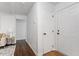 Welcoming entryway featuring hardwood floors, neutral paint, and a glimpse of the bright and airy interior at 3907 Inwood Dr, Durham, NC 27705