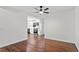 View of the open-concept living room and kitchen featuring hardwood floors at 3907 Inwood Dr, Durham, NC 27705