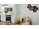 Inviting living room showcases stylish decor, comfortable seating, and an open layout to the kitchen area at 3907 Inwood Dr, Durham, NC 27705