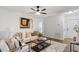Inviting living room with comfortable seating, contemporary art, and open layout at 3907 Inwood Dr, Durham, NC 27705