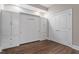 Cozy bedroom with custom Murphy bed and ample closet space at 400 W North St # 1430, Raleigh, NC 27603
