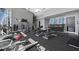 Well-equipped gym with modern equipment, large windows, and ample natural light at 400 W North St # 1430, Raleigh, NC 27603