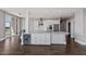 Modern kitchen with large island, stainless appliances, and beverage cooler at 400 W North St # 1430, Raleigh, NC 27603