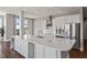Gourmet kitchen with stainless steel appliances, sleek countertops, and center island at 400 W North St # 1430, Raleigh, NC 27603