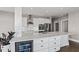 Well-designed kitchen with a beverage cooler, an island, and stainless steel appliances at 400 W North St # 1430, Raleigh, NC 27603