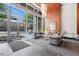 Modern lobby with an open layout, light grey couches and large windows at 400 W North St # 1430, Raleigh, NC 27603