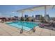 Rooftop pool with lounge chairs, city views, and modern design at 400 W North St # 1430, Raleigh, NC 27603
