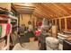 Spacious attic storage with plywood, shelving, and lighting offers ample space for organizing belongings at 420 Cherry St, Fuquay Varina, NC 27526