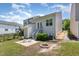 Charming backyard with patio, fire pit, and fenced yard at 420 Cherry St, Fuquay Varina, NC 27526