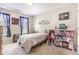 Fun bedroom featuring Star Wars decor, a bed, and a colorful bookshelf creating an imaginative and playful space at 420 Cherry St, Fuquay Varina, NC 27526