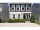 Charming home exterior with well-kept landscaping and a welcoming front porch seating area at 420 Cherry St, Fuquay Varina, NC 27526
