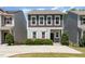 Charming two-story home with landscaped yard, inviting front porch, and a well-maintained lawn, perfect for curb appeal at 420 Cherry St, Fuquay Varina, NC 27526
