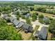 Neighborhood aerial view showcases beautiful tree-lined streets and manicured lawns at 4805 Ayden Mill Rd, Apex, NC 27539