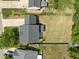 Overhead view of a gray roofed home and meticulously maintained backyard with manicured grass at 4805 Ayden Mill Rd, Apex, NC 27539