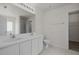 Bathroom features a double sink vanity and separate room with shower and toilet at 4805 Ayden Mill Rd, Apex, NC 27539