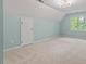 Spacious room with carpet, ample lighting, and a closet, perfect for versatile usage at 4900 American Dr, Durham, NC 27705