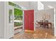 Open doorway view of a dining room with wood floors, table and chairs at 4900 American Dr, Durham, NC 27705