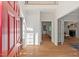 Bright foyer with hardwood floors, high ceilings, and views into the living areas at 4900 American Dr, Durham, NC 27705