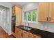Kitchen featuring stainless steel sink, granite countertops, and wooden cabinets at 51 Abernathy Dr, Chapel Hill, NC 27517