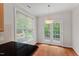 Kitchen nook featuring a window and french doors overlooking the yard at 51 Abernathy Dr, Chapel Hill, NC 27517