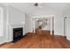 Inviting living room boasts hardwood floors, a fireplace, and a staircase, creating an open and airy atmosphere at 51 Abernathy Dr, Chapel Hill, NC 27517