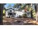 Spacious backyard features a fire pit and deck perfect for relaxation at 512 Stratford Dr, Zebulon, NC 27597