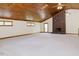 Very large bedroom featuring a wood ceiling, brick fireplace, and ample natural light at 512 Stratford Dr, Zebulon, NC 27597